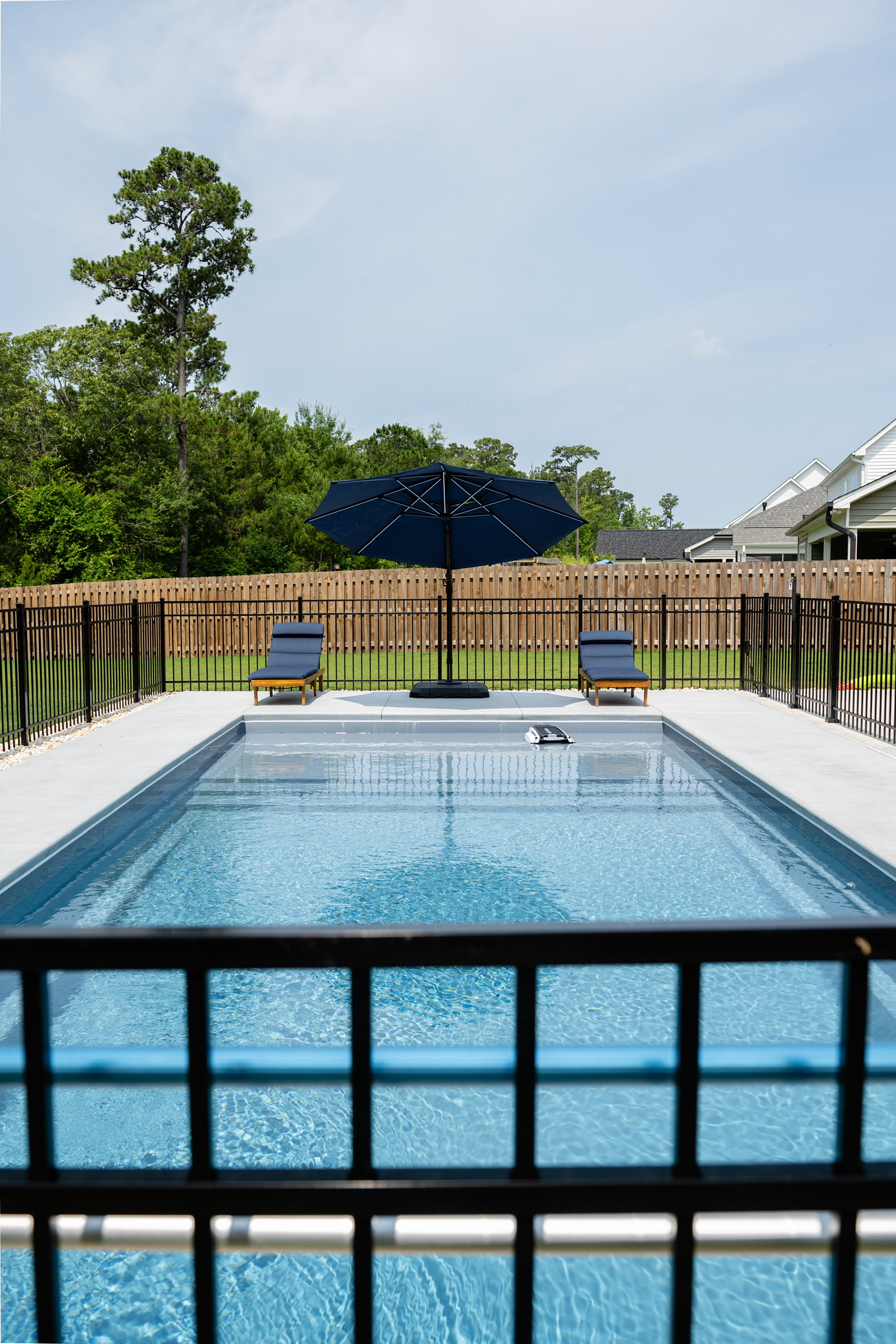 Fiberglass pool with tanning ledge built in Hampstead NC